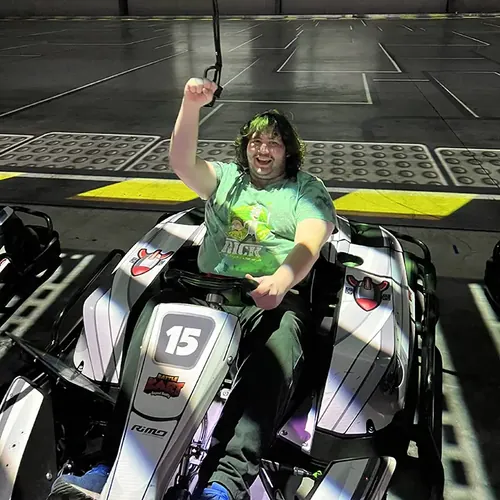 NDIS participants go-karting with TDAC disability support workers